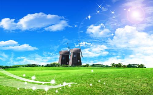 ветряк мельницы на солнечном зеленом поле